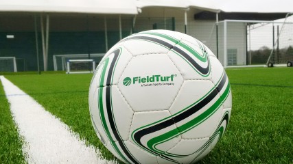 soccer/football ball with fieldturf logo on fieldturf field